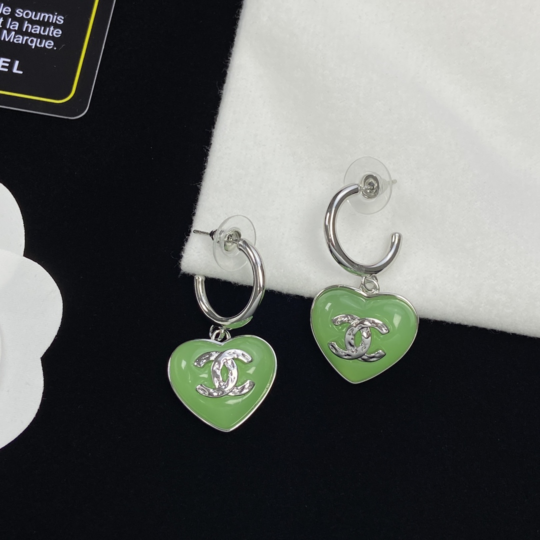 Top CHANEL Metallic Green Heart Earrings - silver