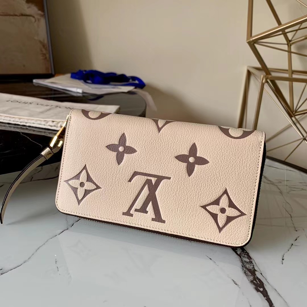 TOP Louis Vuitton LV LV Zippy Wallet Empreinte Crafty 2 Tones - Cream