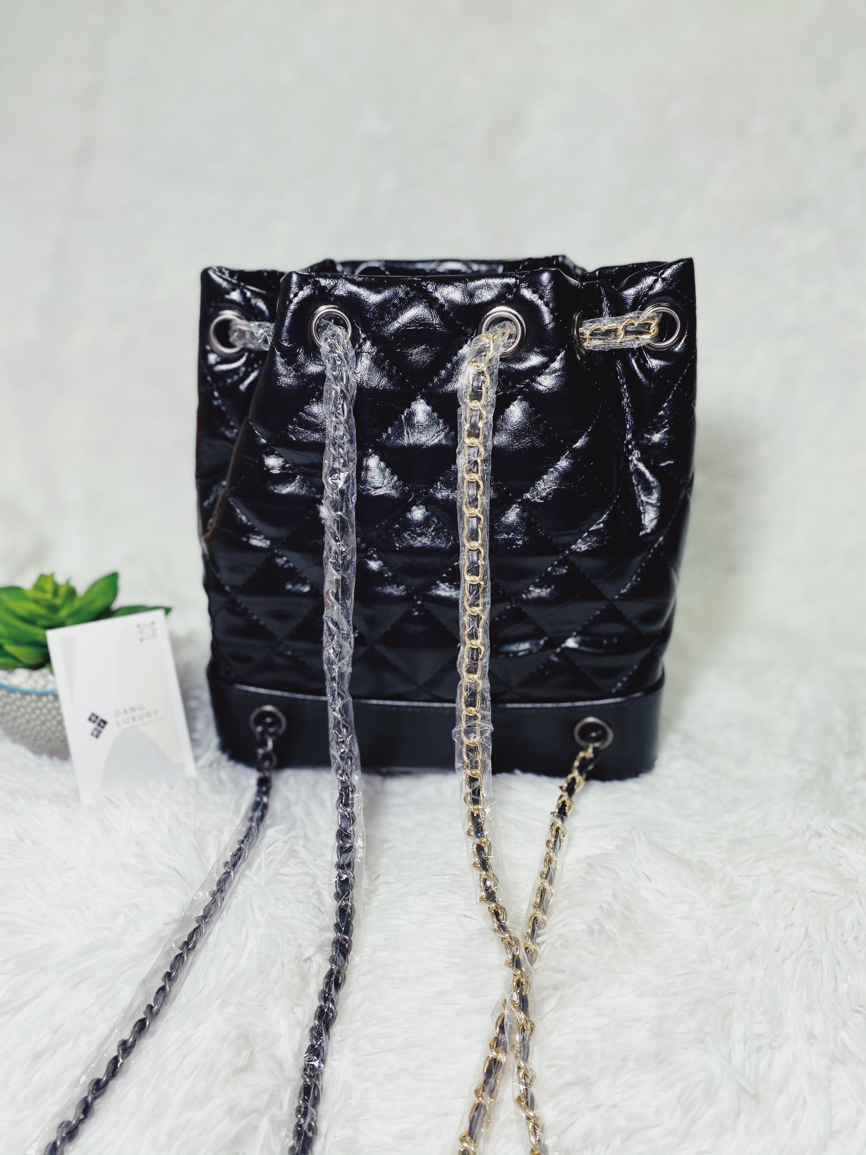 TOP CHANEL Quilted Bucket Backpack - BLACK