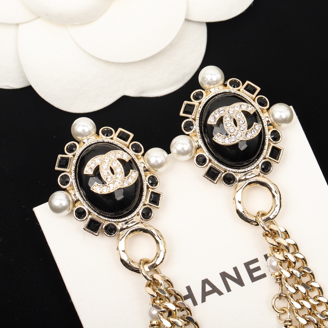 TOP CHANEL Black Oval Pearl Tassel Earrings