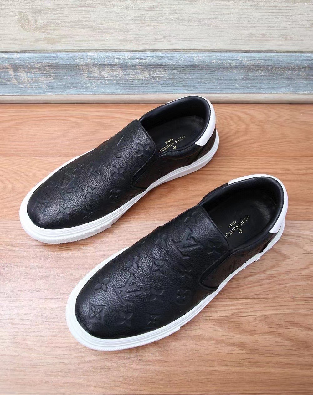 Louis Vuitton Slip‑on Sneakers Black Embossed Monogram Leather White Sole Unisex Shoes