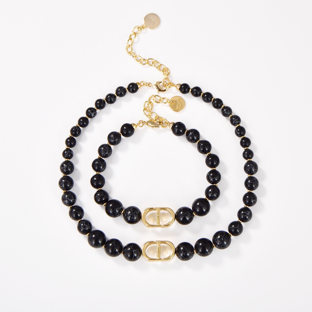 TOP Christian Dior bracelet in gold plated metal and black crystals bracelet/necklace