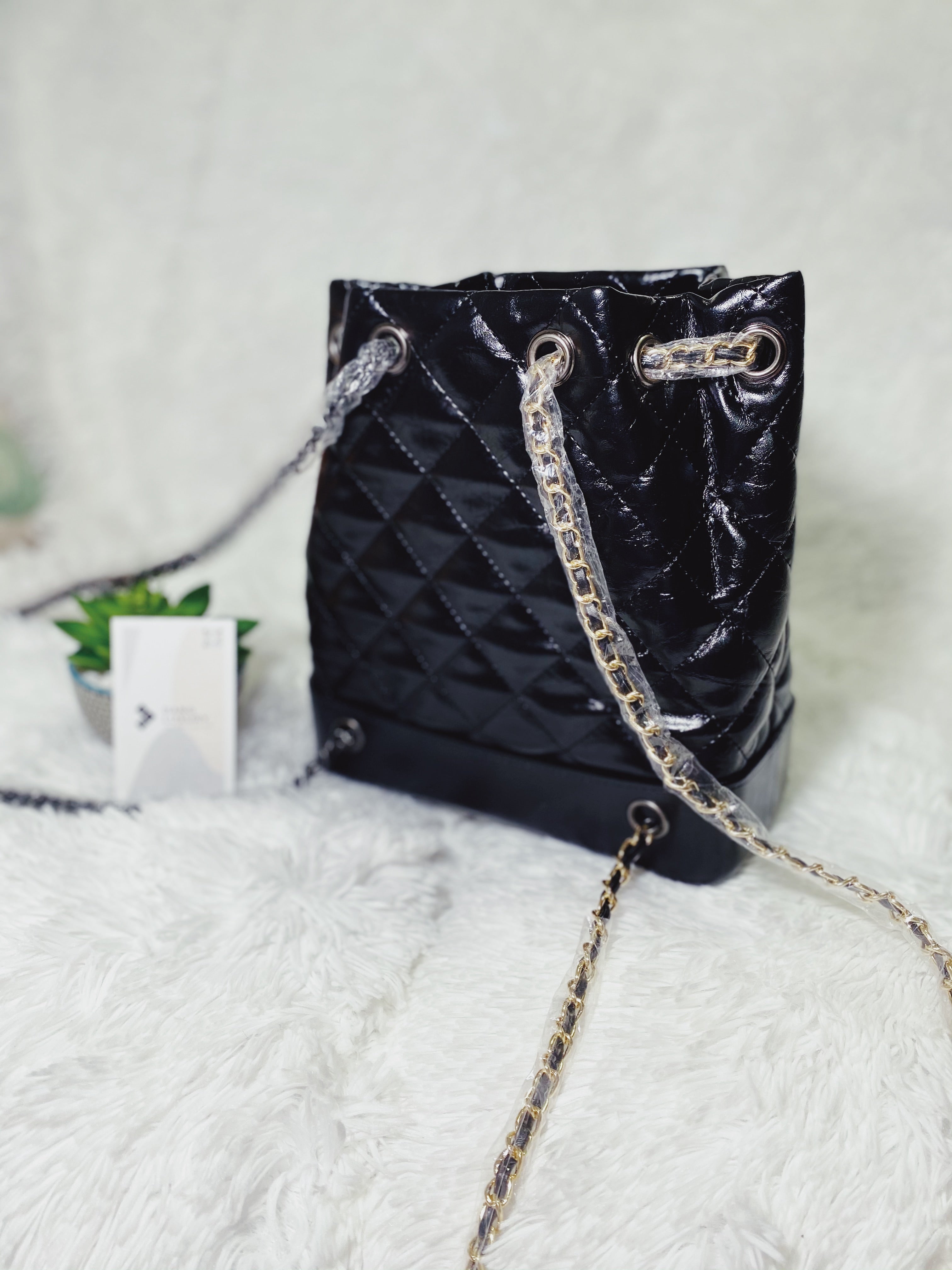 TOP CHANEL Quilted Bucket Backpack - BLACK