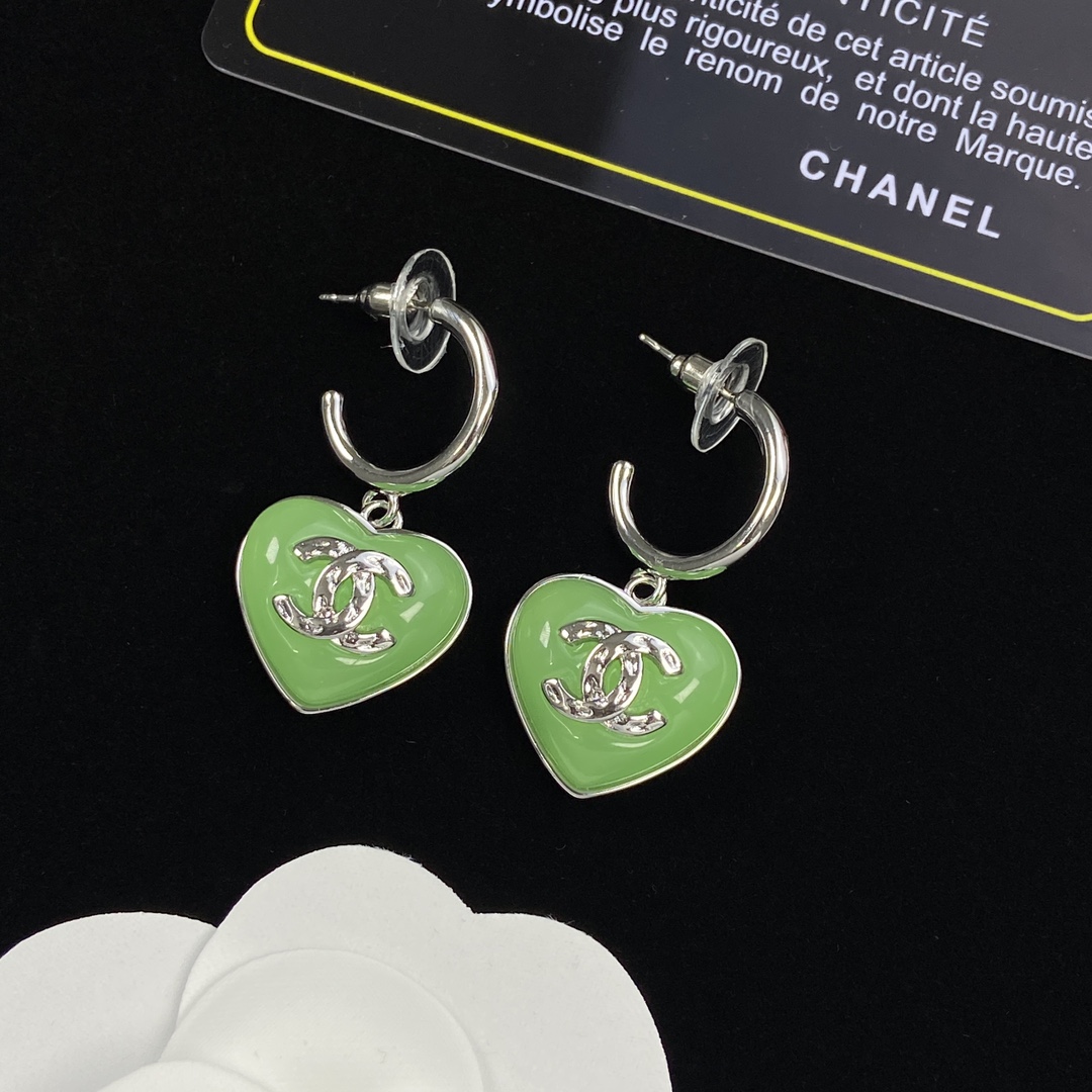 Top CHANEL Metallic Green Heart Earrings - silver