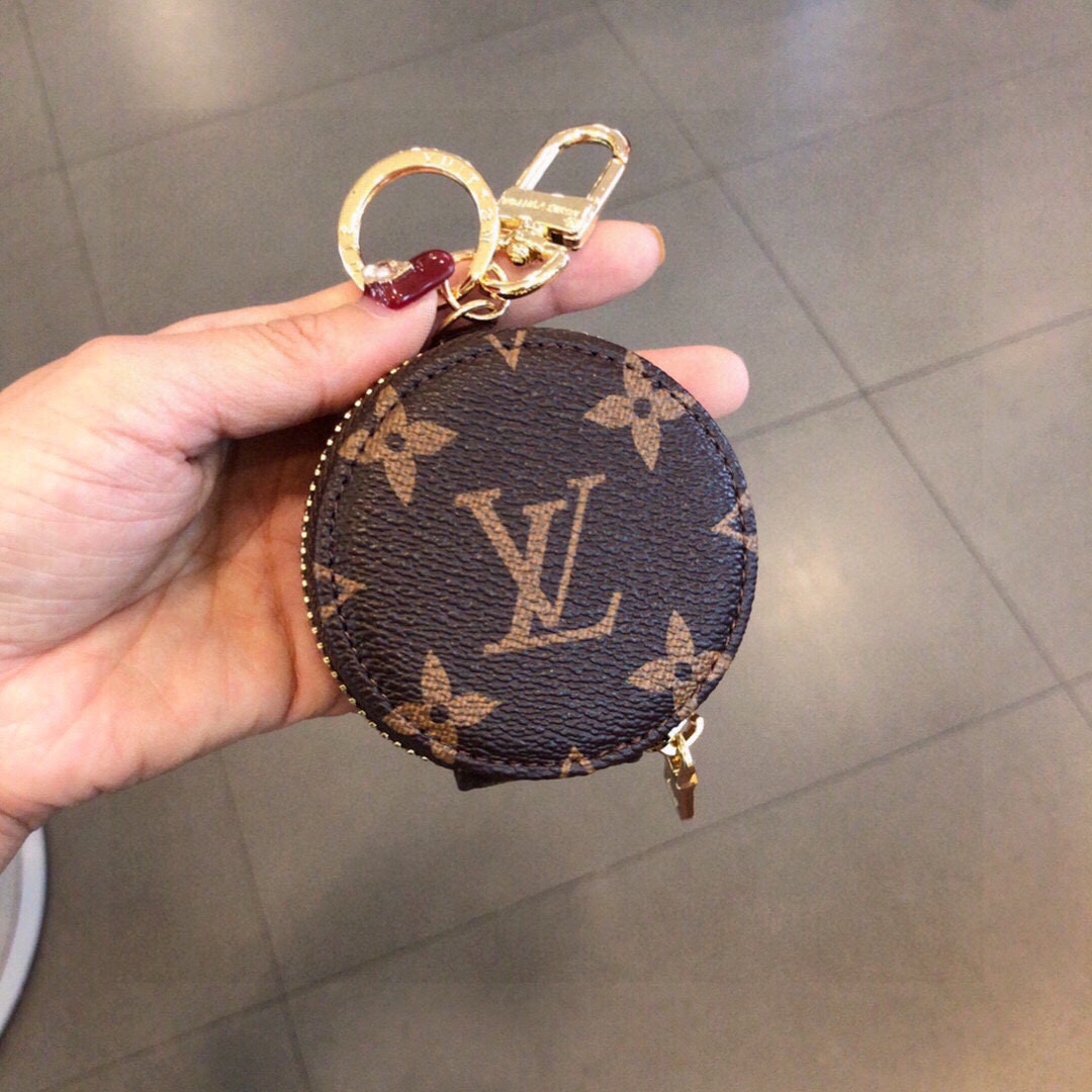 TOP Louis Vuitton LV Classic Monogram Bluetooth Headphone Bag Keychain - 3 Color