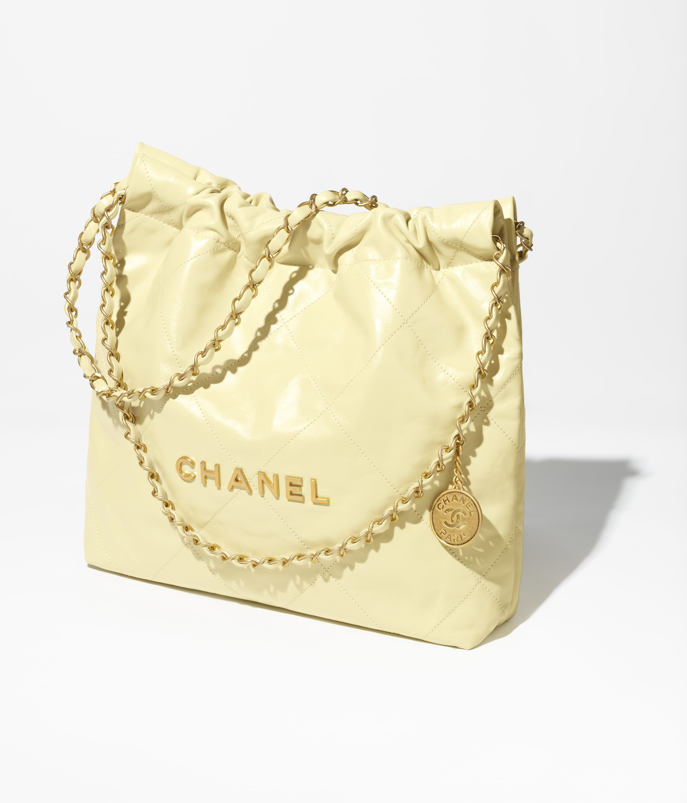 CHANEL 22 SMALL HANDBAG Shiny Calfskin & Gold-Tone Metal Light Yellow