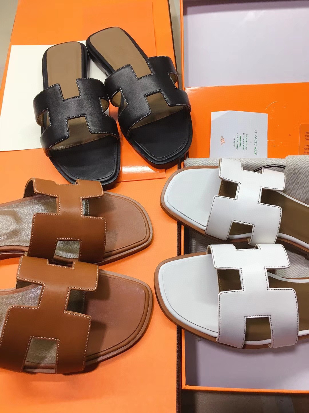 TOP HERMES Oran Smooth Leather Slides - Black/White/Brown