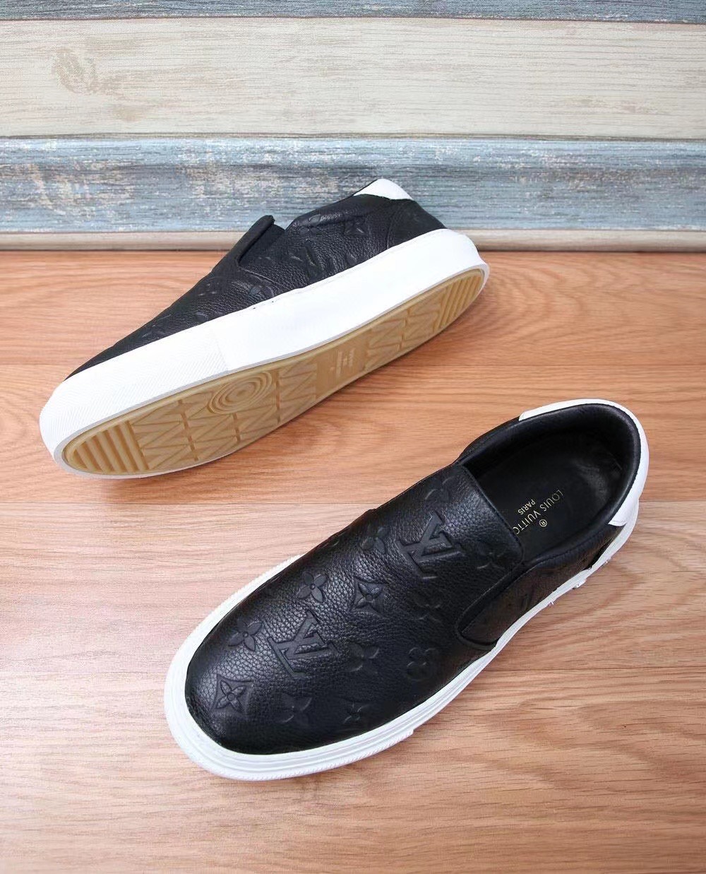 Louis Vuitton Slip‑on Sneakers Black Embossed Monogram Leather White Sole Unisex Shoes