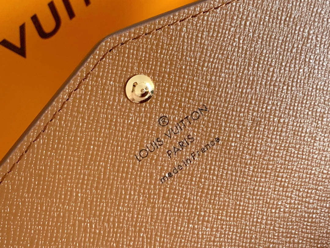 TOP Louis Vuitton LV L*V Monogram Sarah Wallet - Brown