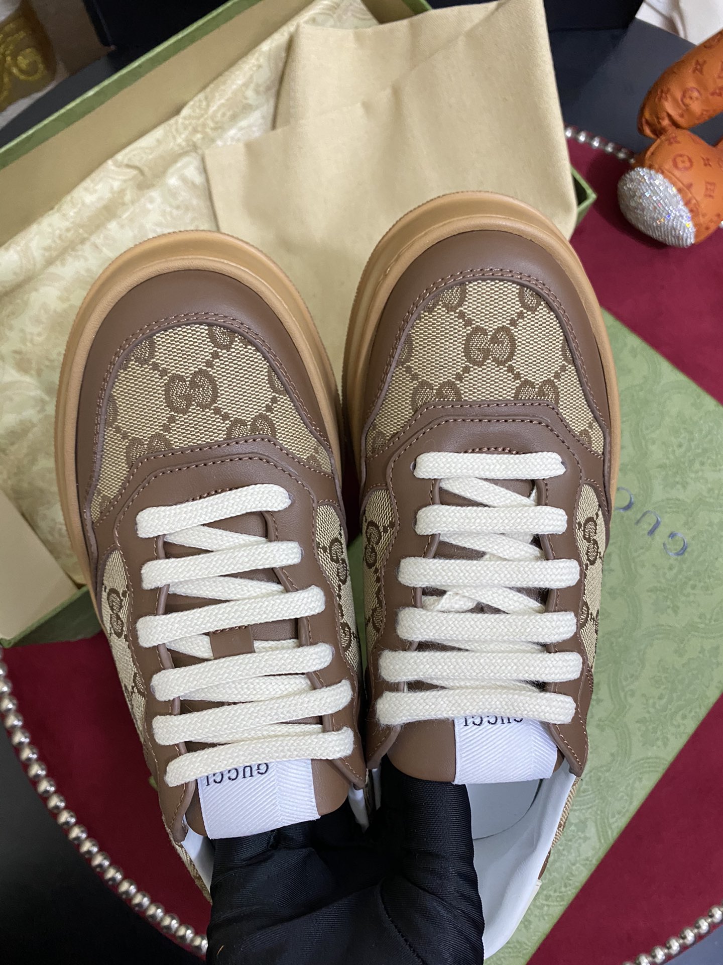 TOP GUCCI Double G Embossed Leather Rubber Platform Sneakers - Brown