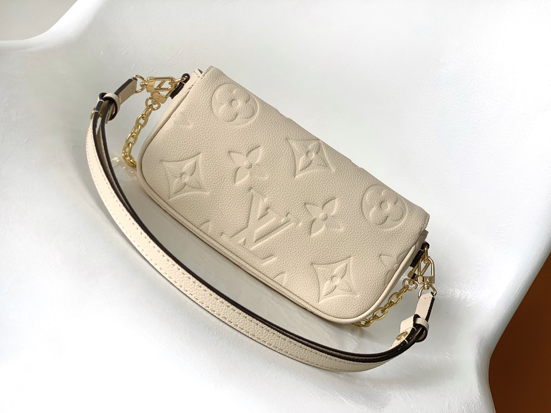 TOP Louis Vuitton LV  Monogram Empreinte Embossed Grained Calfskin Wallet - Biege