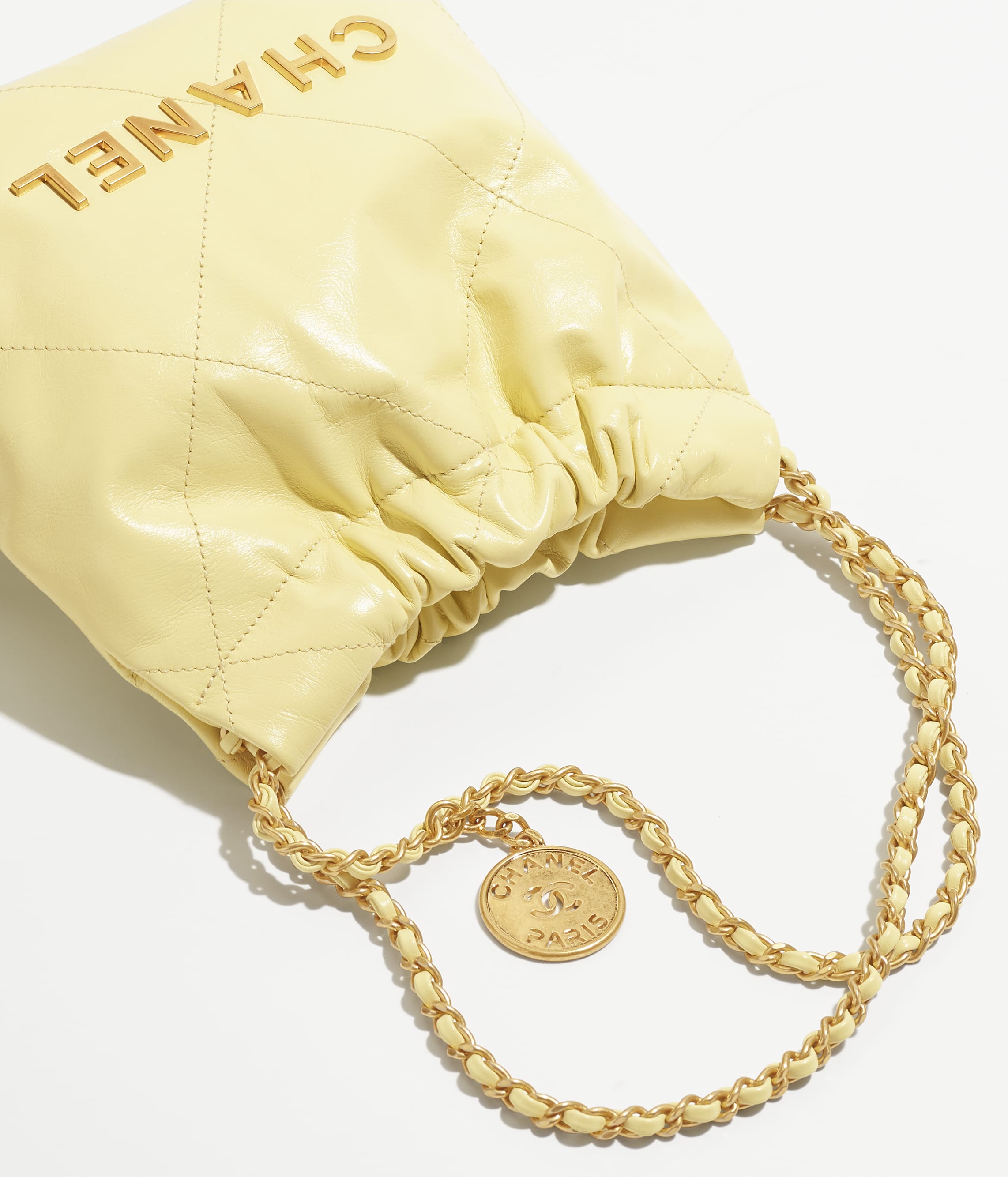 CHANEL 22 MINI HANDBAG Shiny Calfskin & Gold-Tone Metal Light Yellow