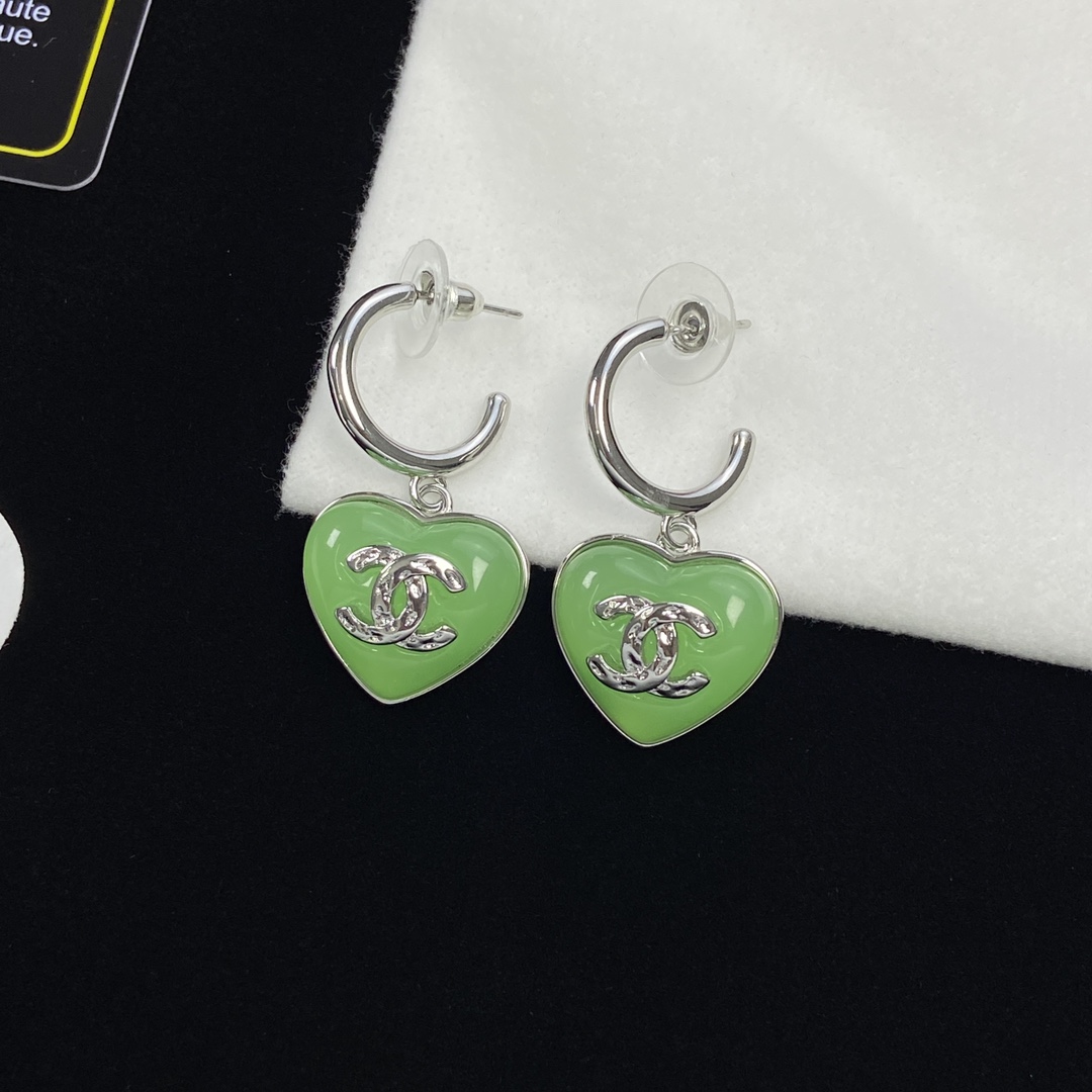 Top CHANEL Metallic Green Heart Earrings - silver