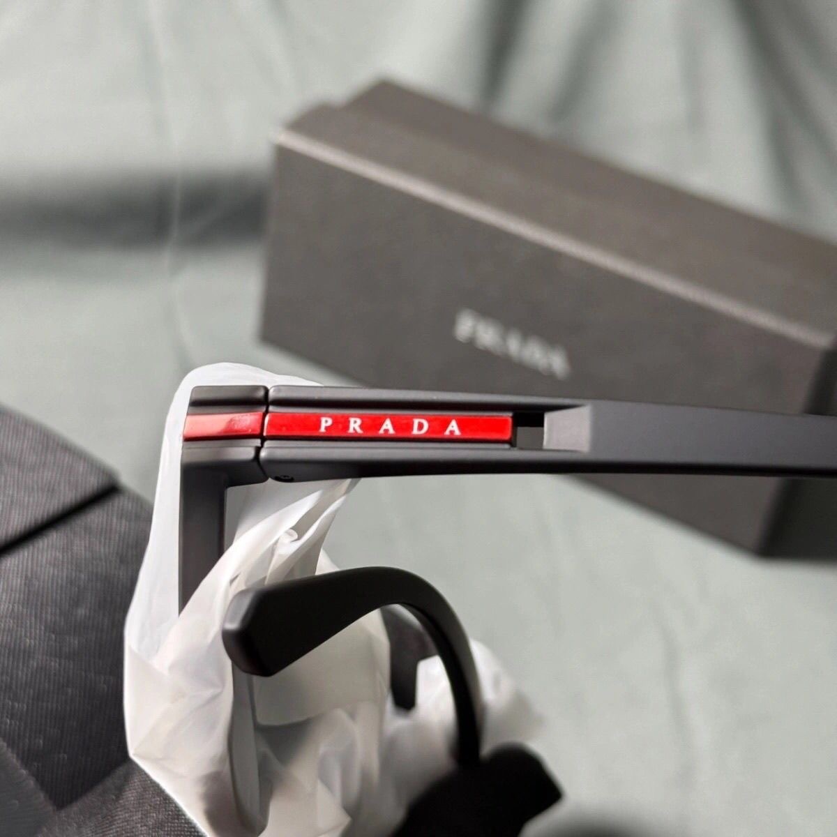 Prada Men's Square Polarized Sunglasses Matte Black Frame Red Logo Temple UV400 Eyewear