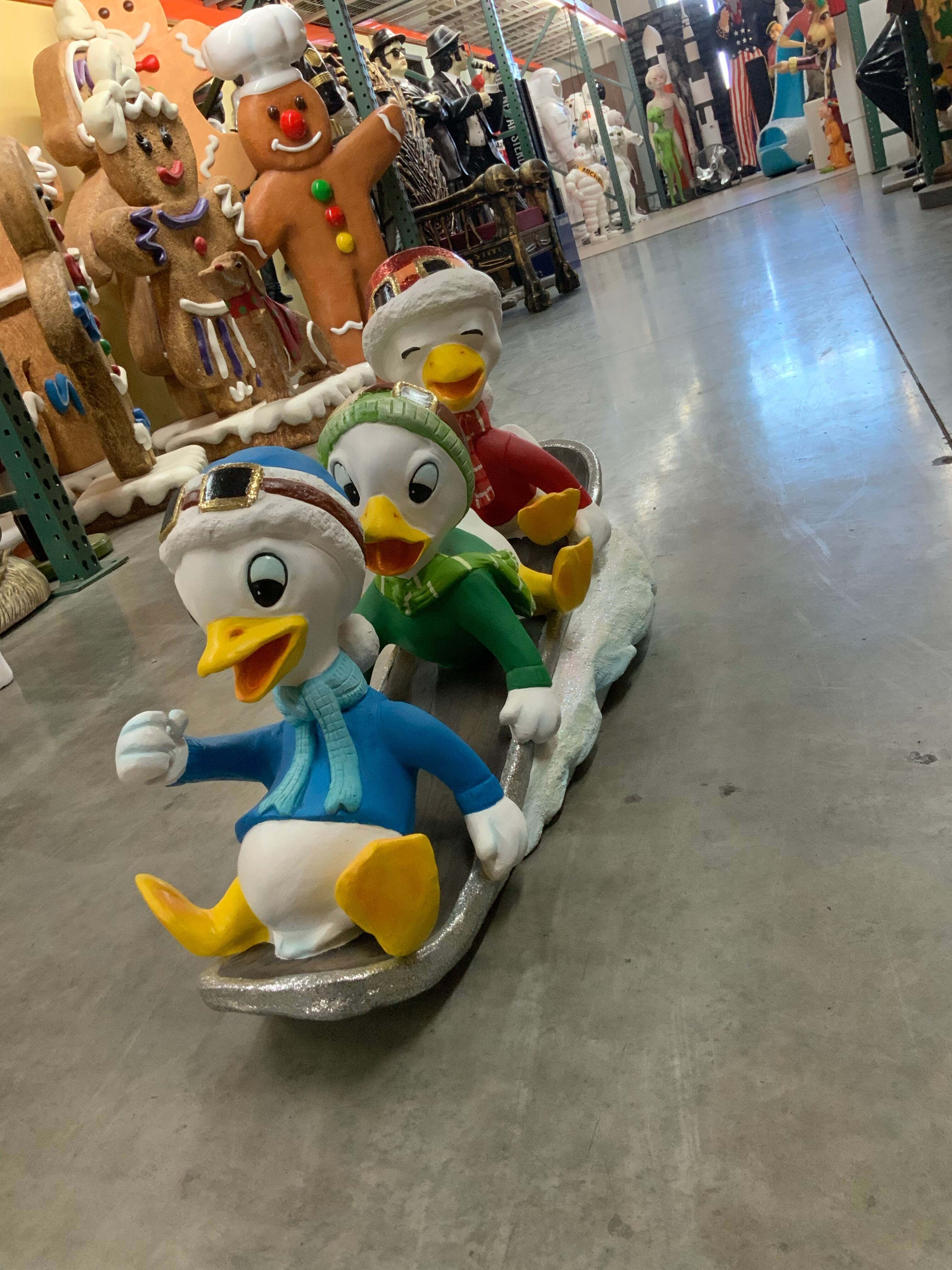 Ducklings On Snowboard Life Size Statue