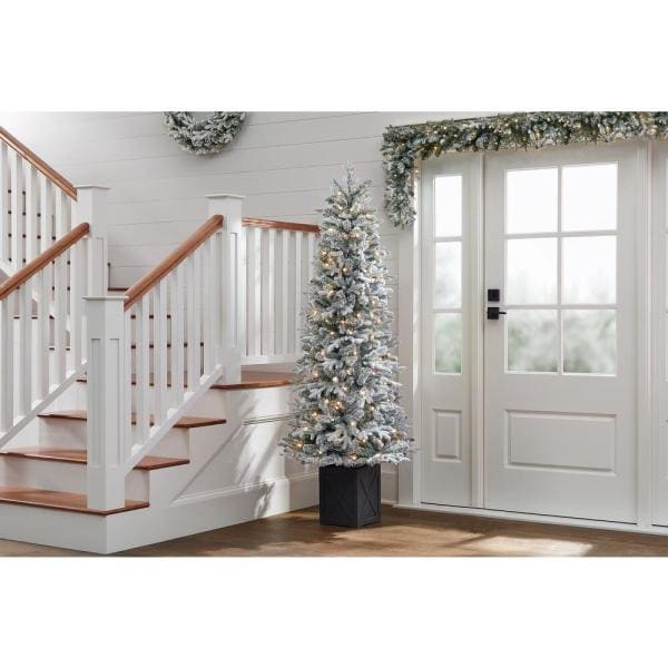 6.5 ft Starry Light Fraser Fir Potted Flocked LED Pre-Lit Artificial Christmas Tree with 150 Cool White Dome Lights