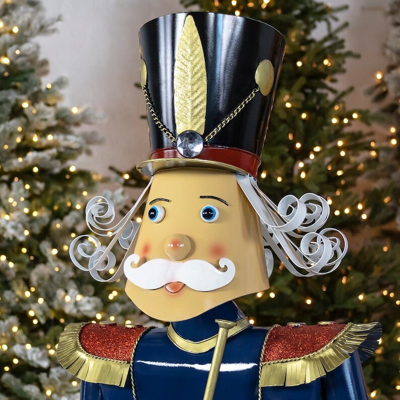 60 Inch Tall Iron Blue Nutcracker Holding Trumpet