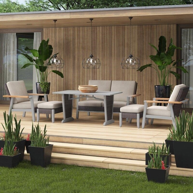 Adler Rectangular 4 - Person 56'' Long Dining Set with Cushions