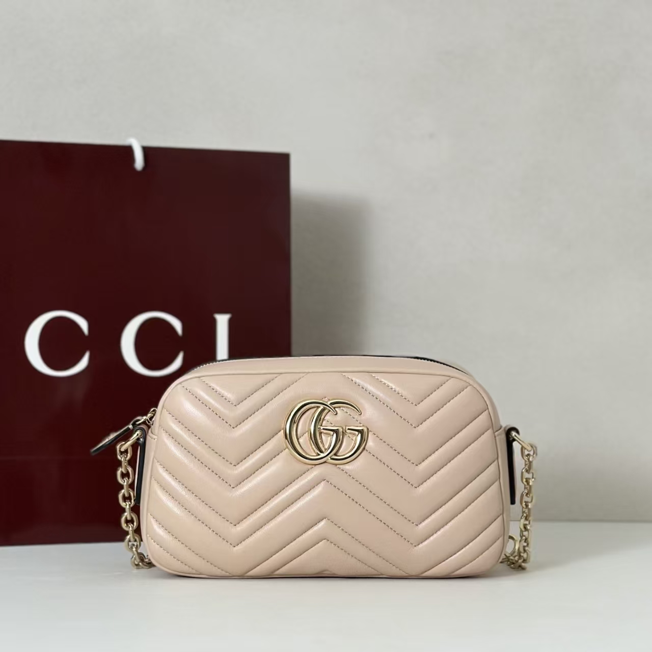 Gucci GG Marmont Small Camera Bag in Apricot Pink | Chevron-Quilted Napa Leather