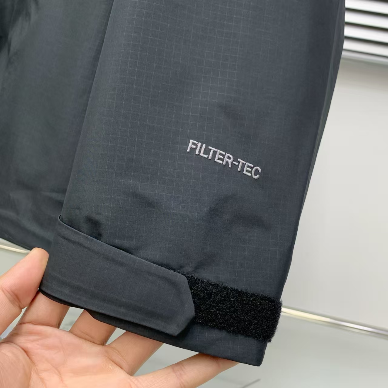 KAILAS Black Lightweight Hardshell – Waterproof Windproof Hooded Jacket with Embroidered Logo