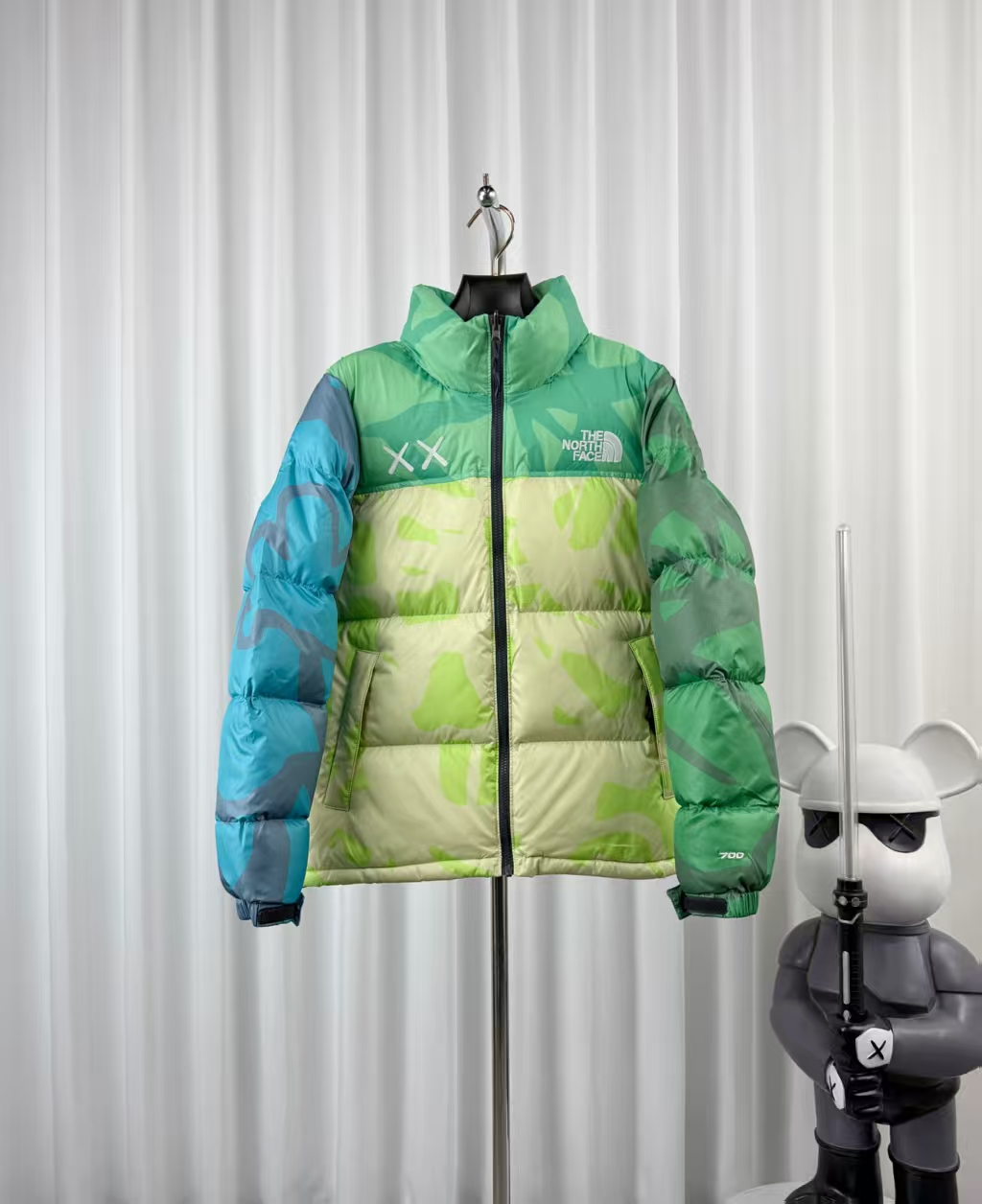 The North Face × KAWS Light Yellow-Green Down Jacket – Artistic Collaboration