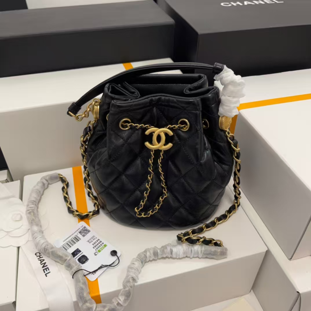 CHANEL Classic Quilted Bucket Bag with Coin Charm and Handle