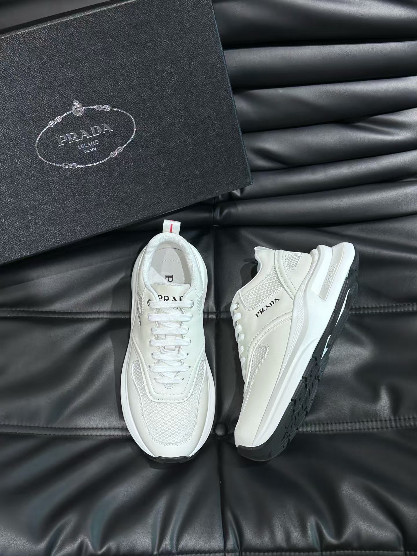 Prada Men's White Calfskin & Mesh Casual Sneaker | Perforated Leather Athletic Shoe