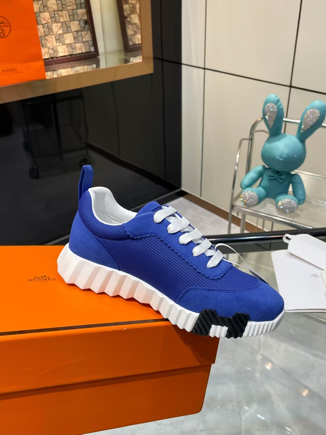 Hermès Sellier Knit Leisure Sneaker in White & Blue | Equestrian-Inspired Luxury Sport Shoe