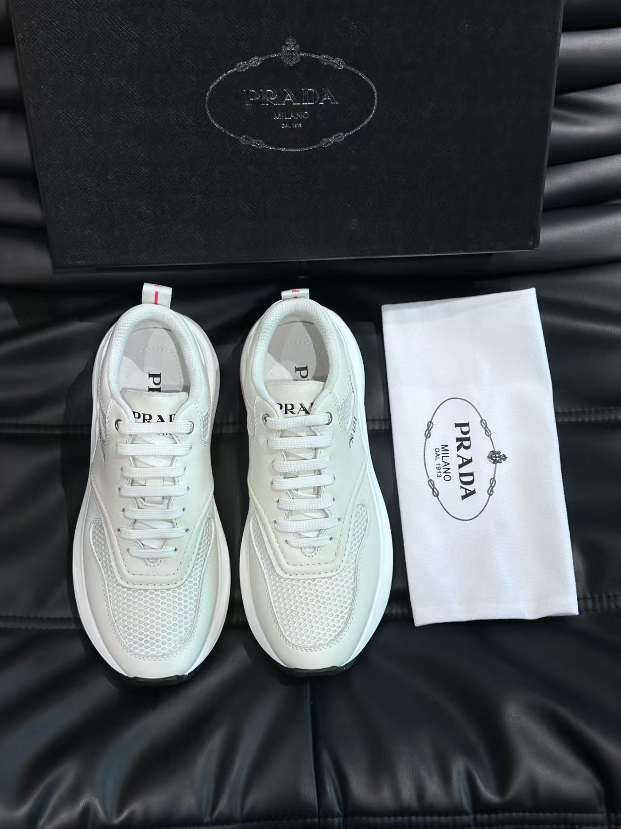 Prada Men's White Calfskin & Mesh Casual Sneaker | Perforated Leather Athletic Shoe