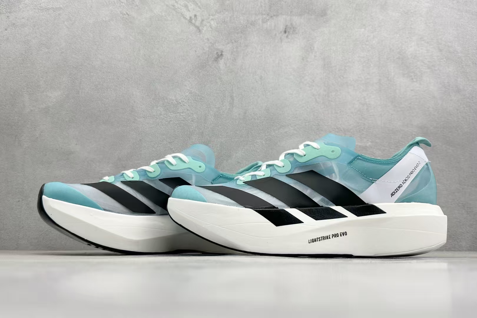 Adidas Adizero Adios Pro Evo 2 in White, Black & Grey | Ultra-Light Breathable Cushioned Racing Shoe