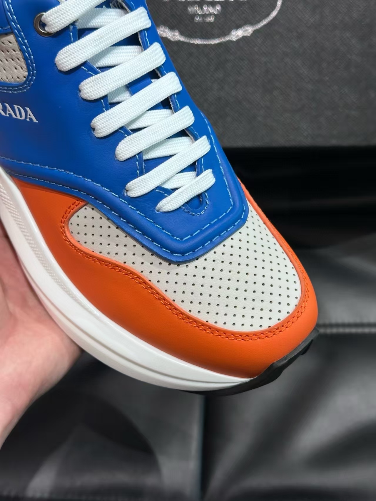 Prada Men's Orange & Blue Calfskin & Mesh Casual Sneaker | Perforated Leather Athletic Shoe