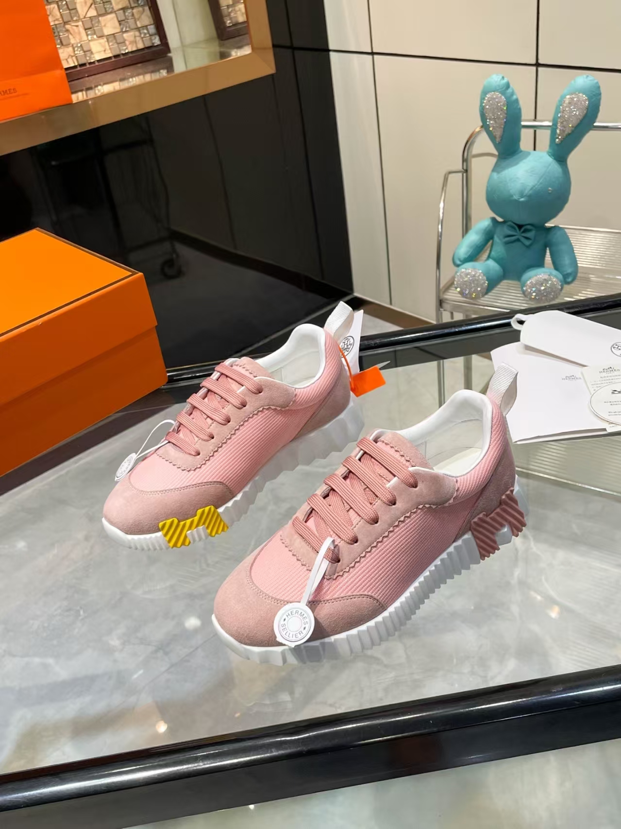 Hermès Sellier Knit Leisure Sneaker in White & Blush Pink | Equestrian-Inspired Luxury Sport Shoe