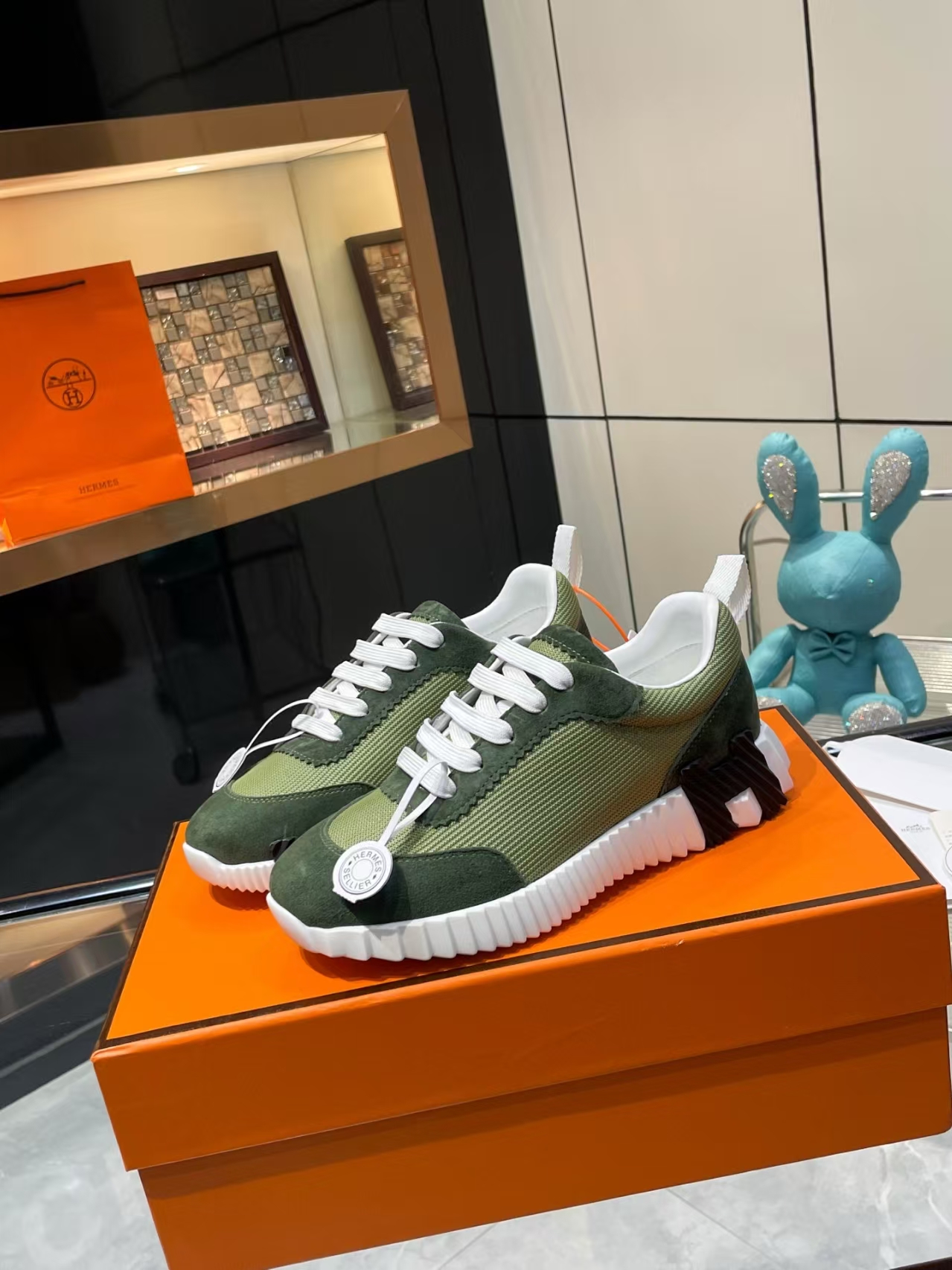 Hermès Sellier Knit Leisure Sneaker in White & Green | Equestrian-Inspired Luxury Sport Shoe