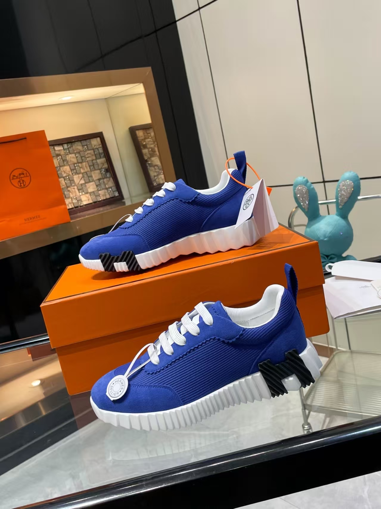 Hermès Sellier Knit Leisure Sneaker in White & Blue | Equestrian-Inspired Luxury Sport Shoe