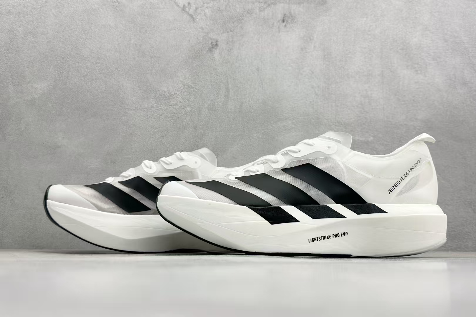 Adidas Adizero Adios Pro Evo 2 White & Black | Ultra-Light Breathable Cushioned Racing Shoe