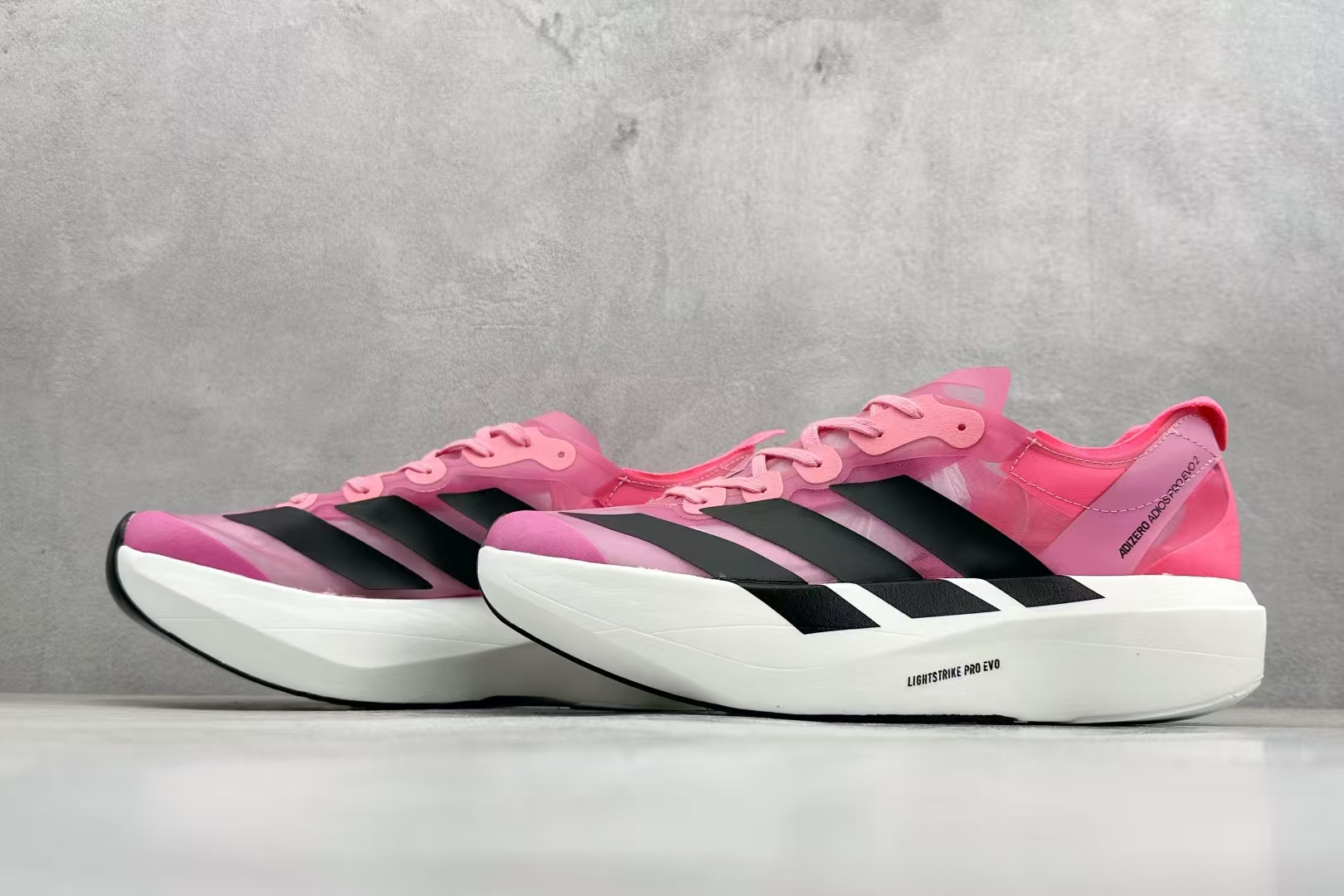 Adidas Adizero Adios Pro Evo 2 in White & Fuchsia | Ultra-Light Breathable Cushioned Racing Shoe