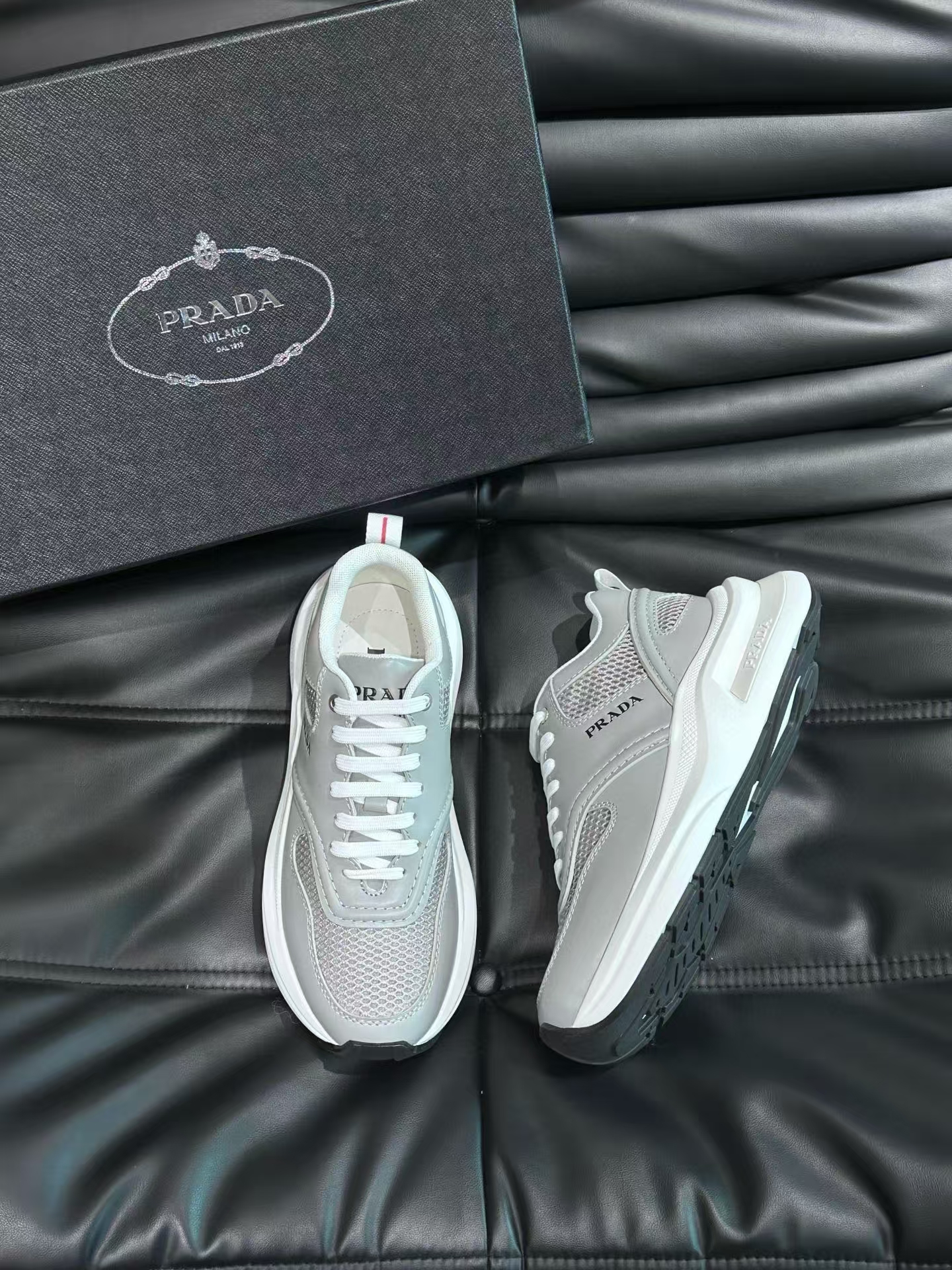 Prada Men's Grey Calfskin & Mesh Casual Sneaker | Perforated Leather Athletic Shoe