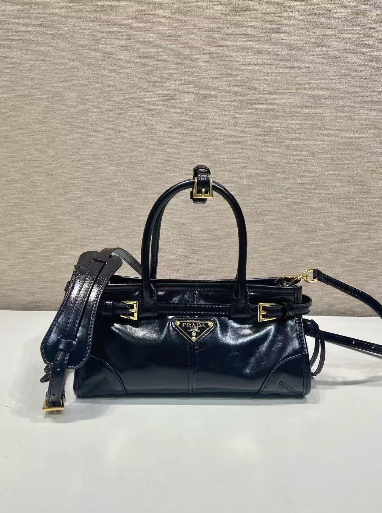 Prada Black Leather Mini Bonnie Bag | Modern Attitude & Side Buckle Detail