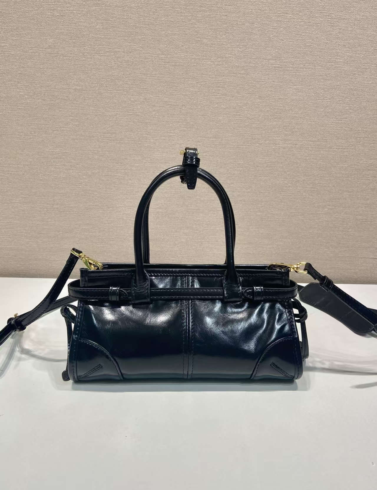 Prada Black Leather Mini Bonnie Bag | Modern Attitude & Side Buckle Detail