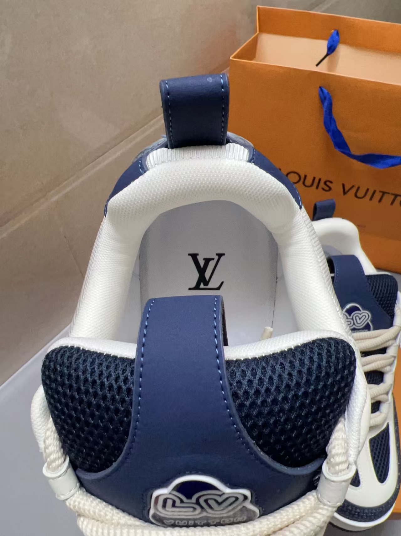 LOUIS VUITTON Monogram Floral Side Accent in White & Navy | Leather & Embroidery Collection