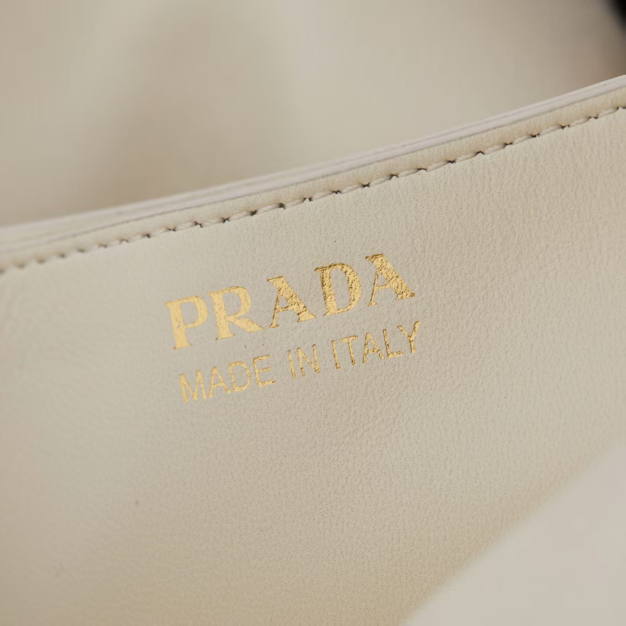 Prada Ivory Small Dada Nappa Leather Bag | Pleated Detail & Warm Organic Elegance