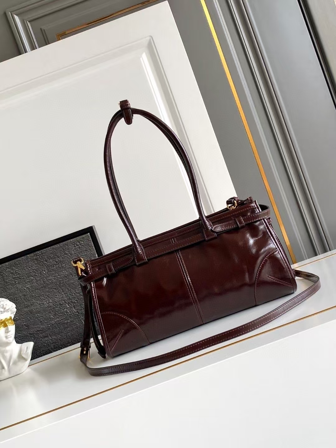 Prada Dark Brown Medium Bonnie Leather Bag | Geometric Design & Glossy Finish