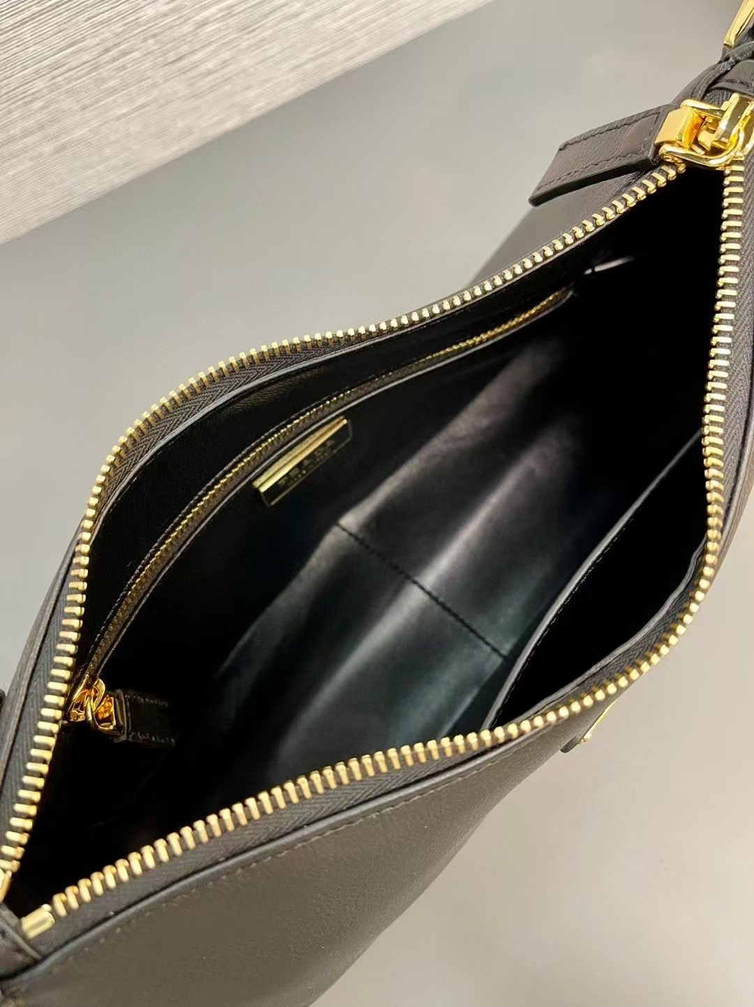Prada Black Medium Aimée Leather Shoulder Bag | 90s Minimalist Design, Soft Silhouette