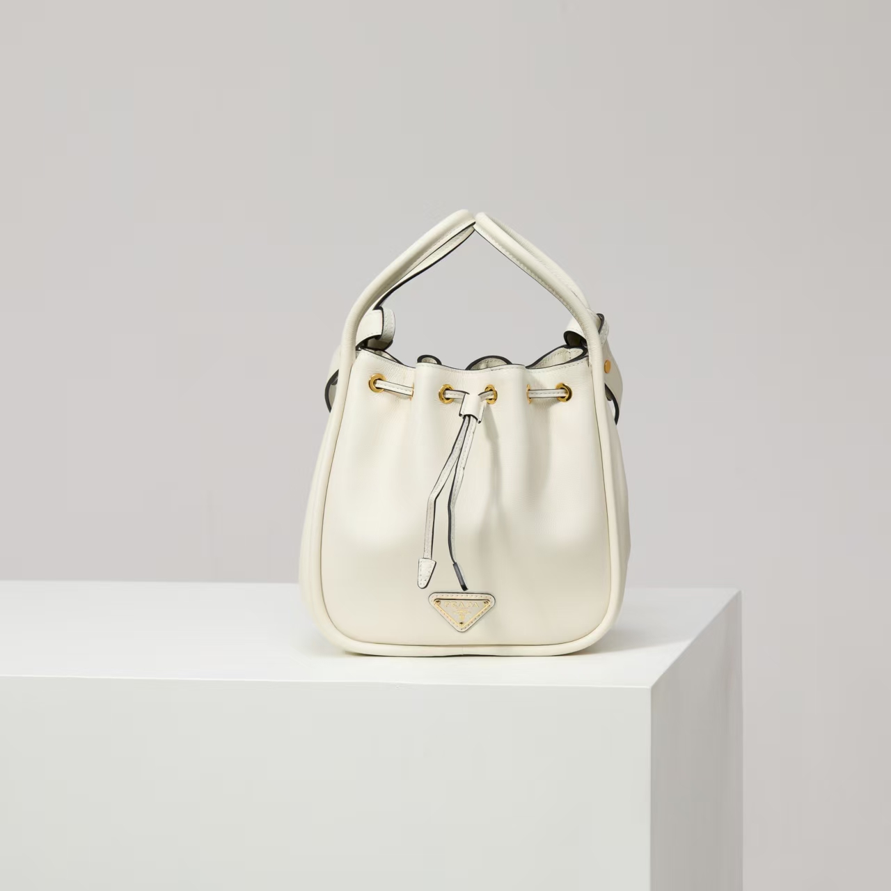 Prada White Re-Edition 1978 Re-Nylon Mini Bag | Iconic Barrel Silhouette & Clean Vintage Style