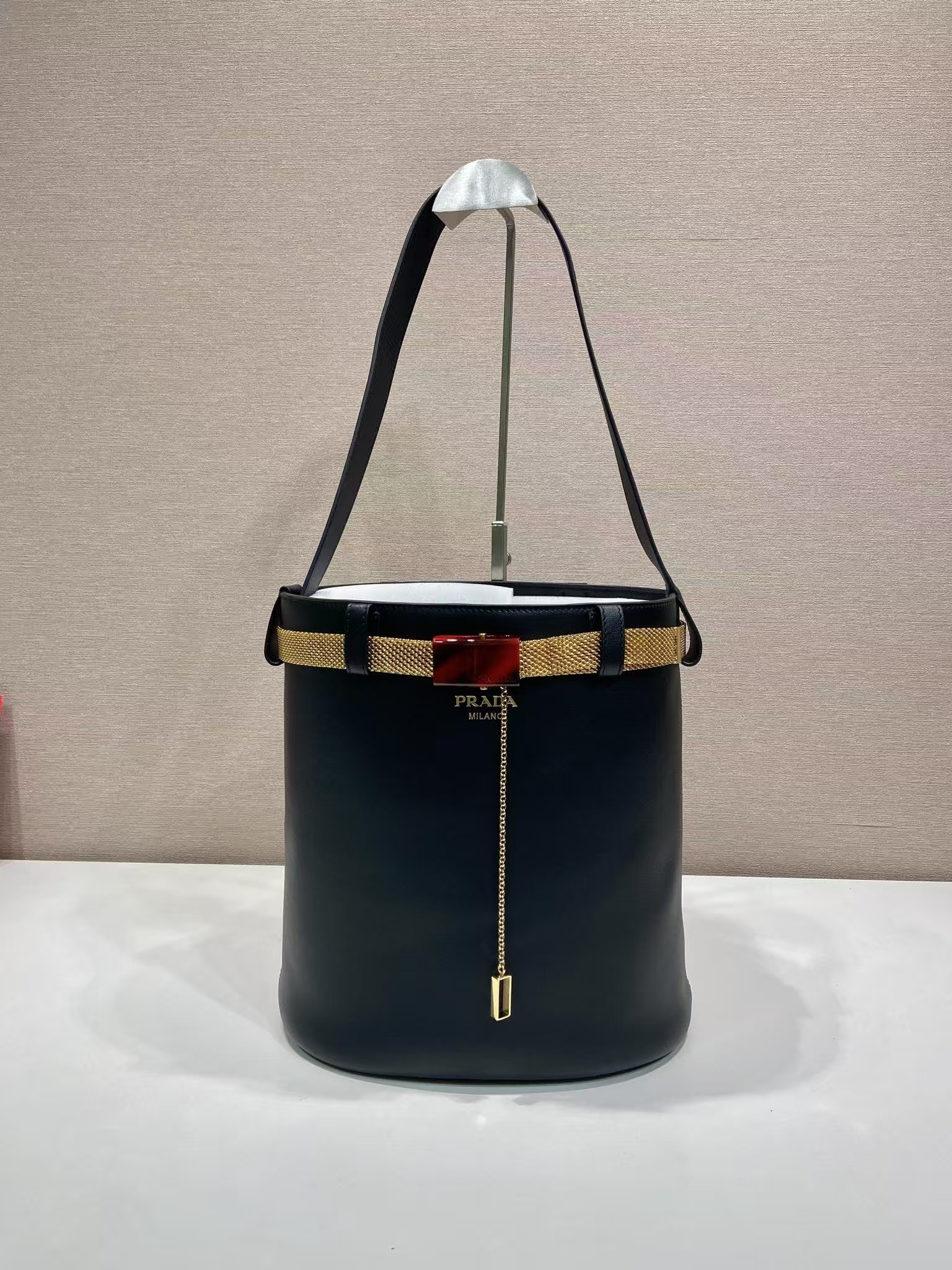 Prada Black Buckle Leather Bucket Bag | Metallic Mesh Strap & Tortoiseshell Buckle