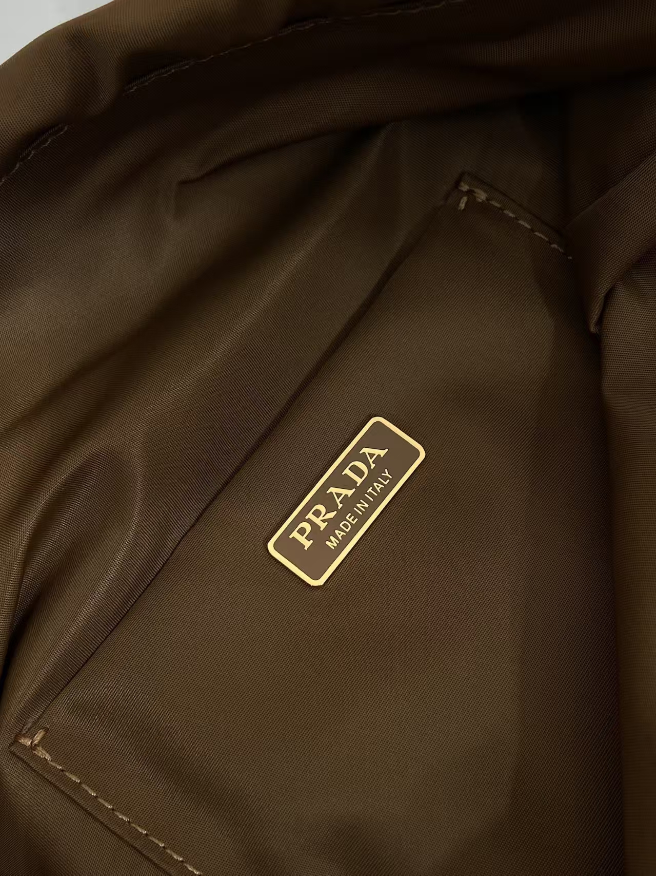 Prada Brandy Recycled Nylon Drawstring Pouch | Vintage Hue & Leather Trim