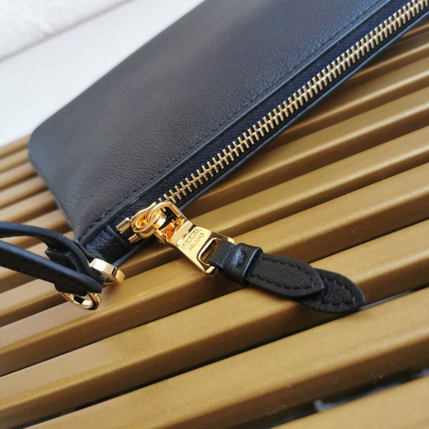 Prada Black Leather Clutch | Geometric Pattern & Adjustable Handle