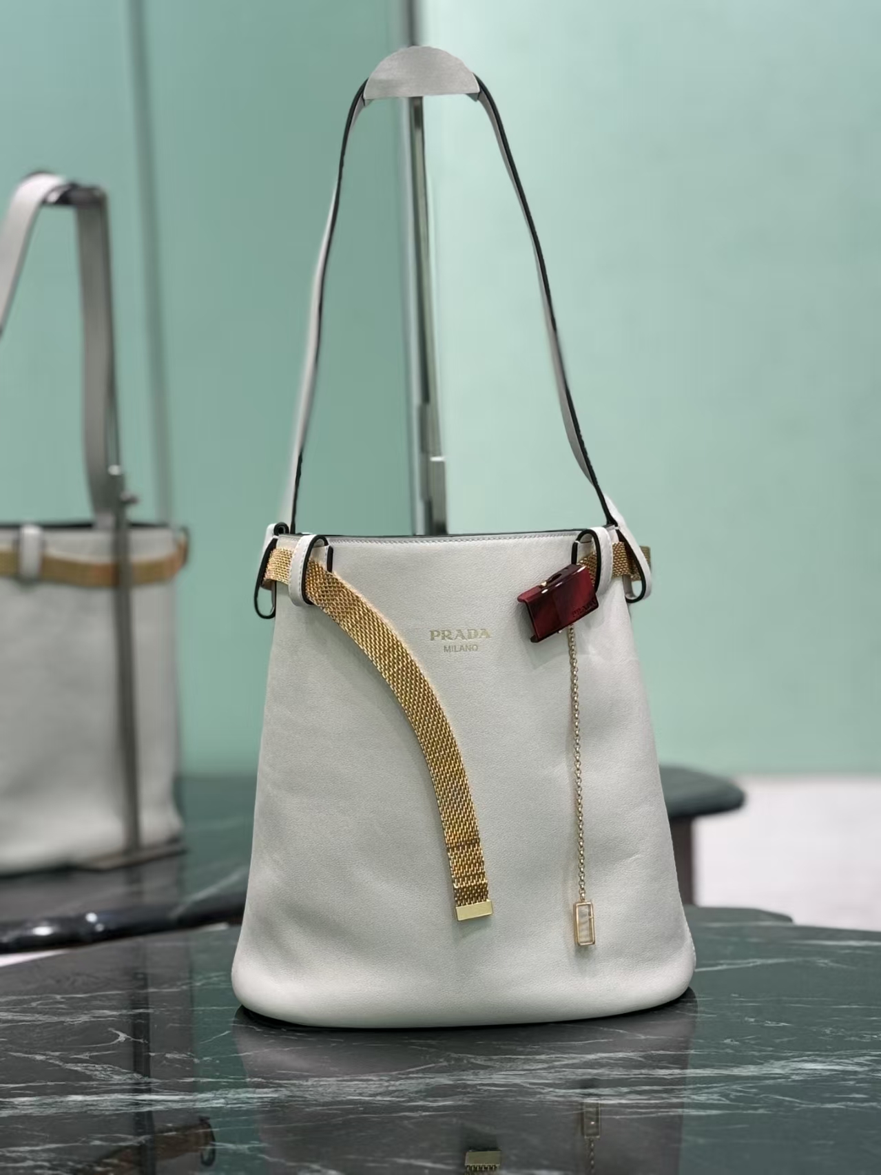 Prada White/Black Buckle Leather Bucket Bag | Two-Tone Contrast & Metallic Mesh Strap
