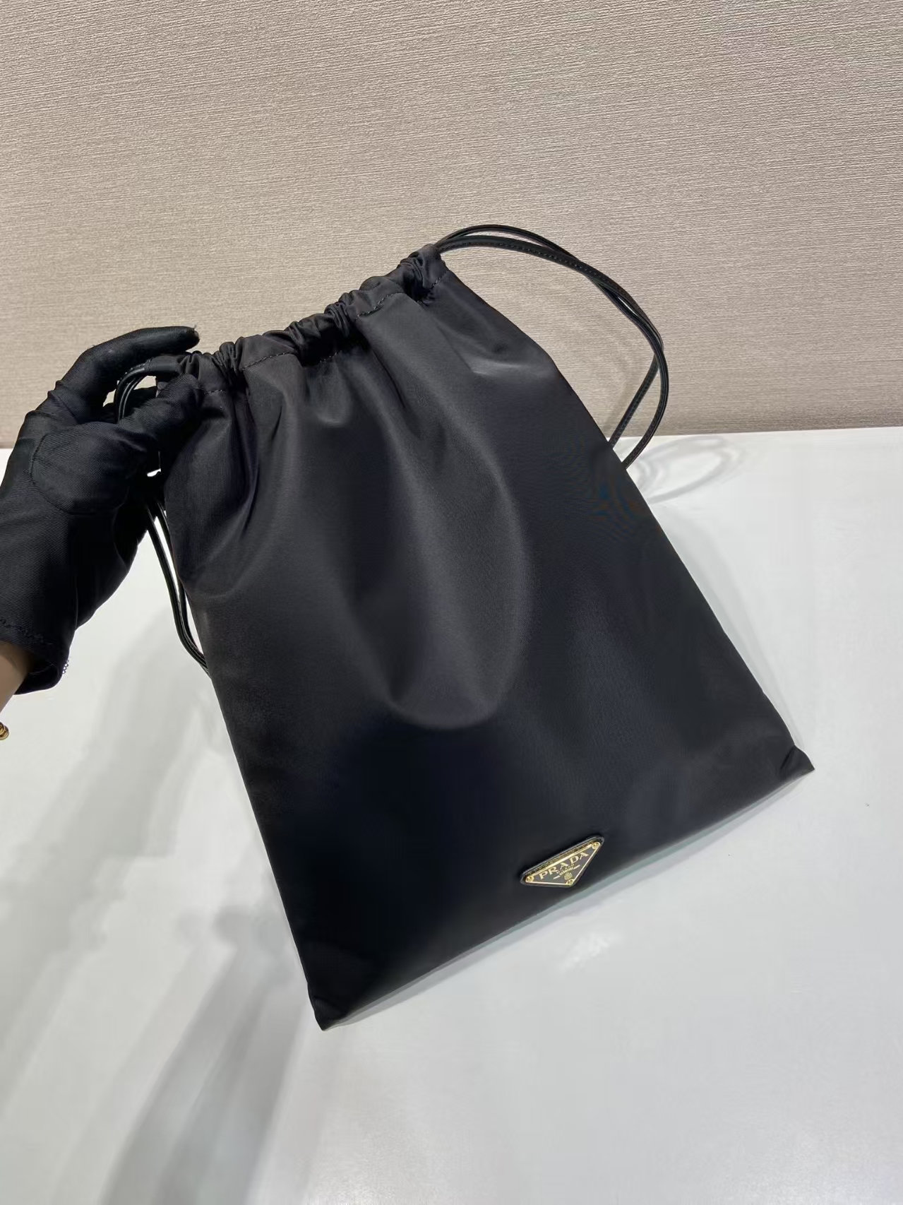 Prada Black Recycled Nylon Drawstring Pouch | Eco-Friendly & Leather Trim