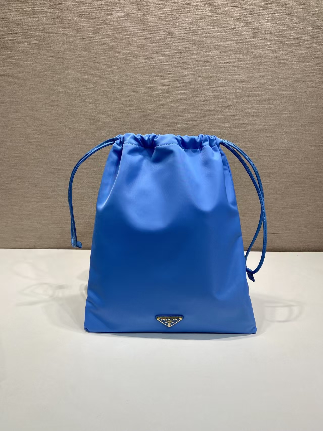 Prada Light Blue Recycled Nylon Drawstring Pouch | Fresh Hue & Leather Trim